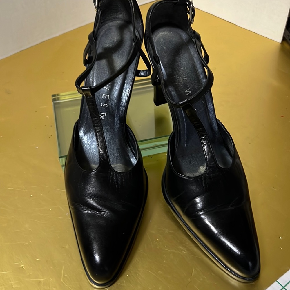 Nine with black leather tee strap heel